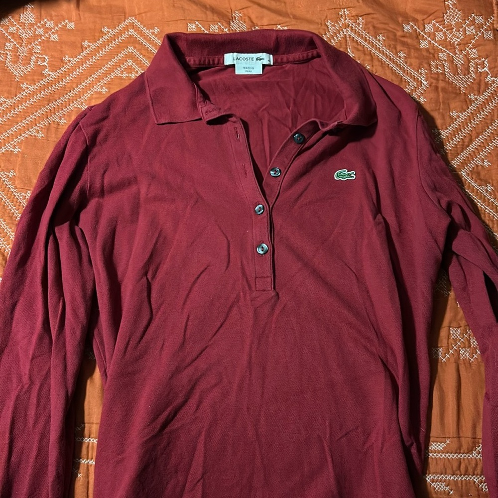 Women’s Lacoste polo 
Size 45- Made in Peru 
Used- in very good condition